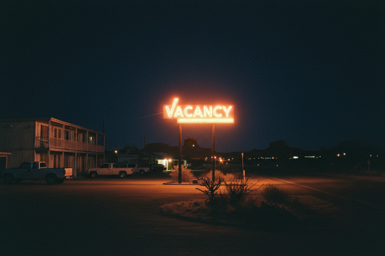Image of night time canon ae-1 portra 1600 of a motel vacancy sign in rural southwest ok
